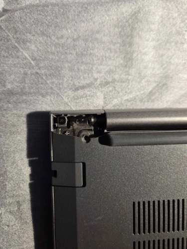 Broken corner on bottom cover